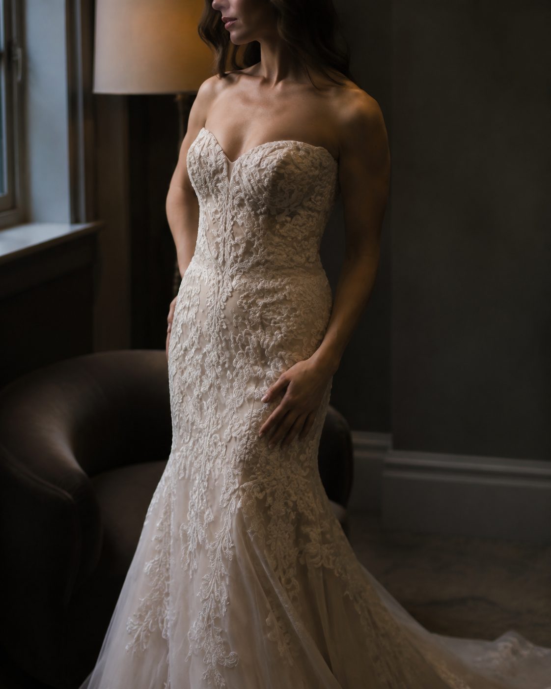 Fit-and-flare gown in corded lace over nude tulle, flaring below the knee